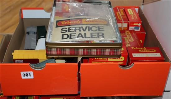 A comprehensive collection of Hornby Tri-Ang carriages, wagons, 12 engines/locomotives including some Australian track side accessories